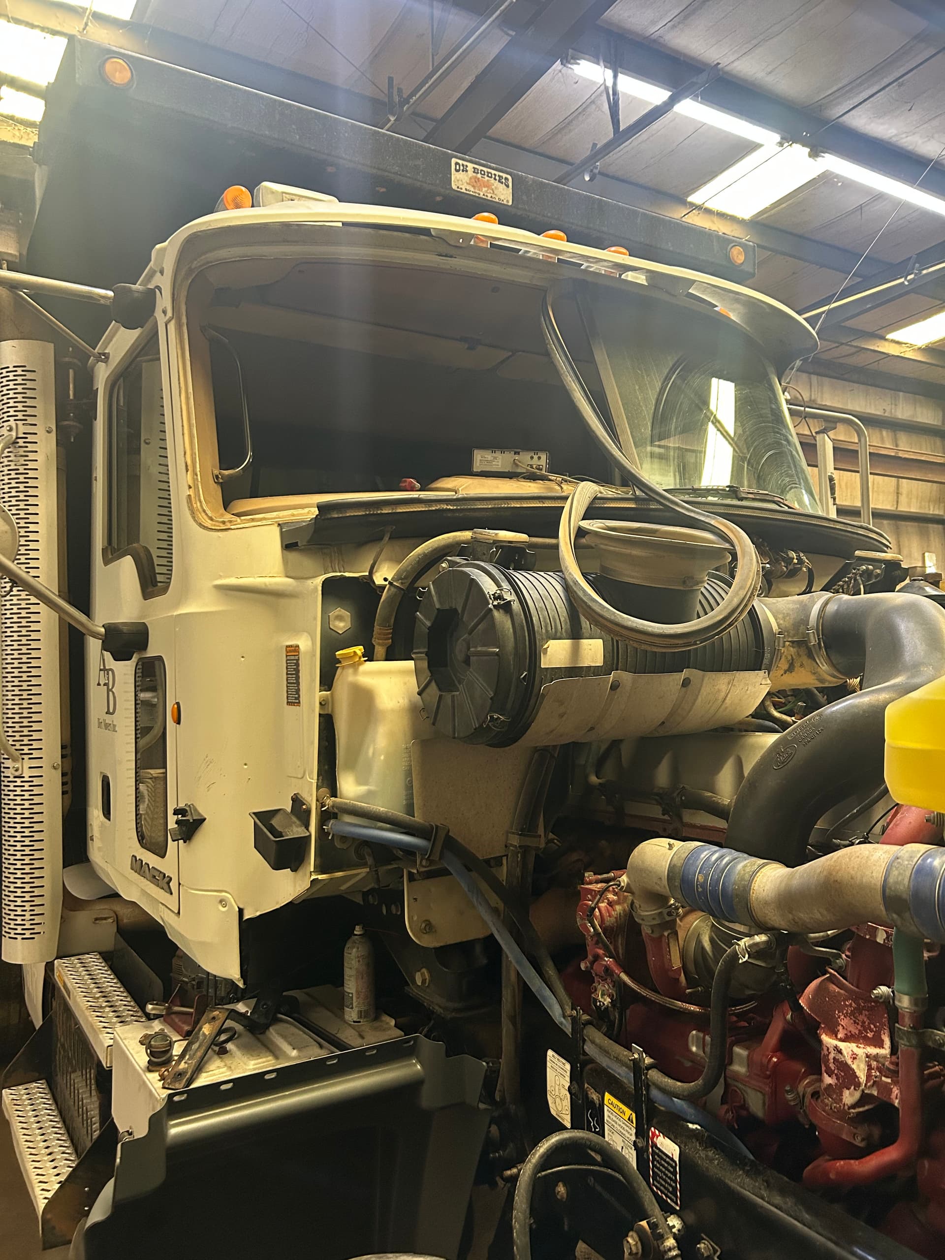 Gallery photos for Heavy Duty Truck Windshield Work on a Mack With the Hood Up: Image #1