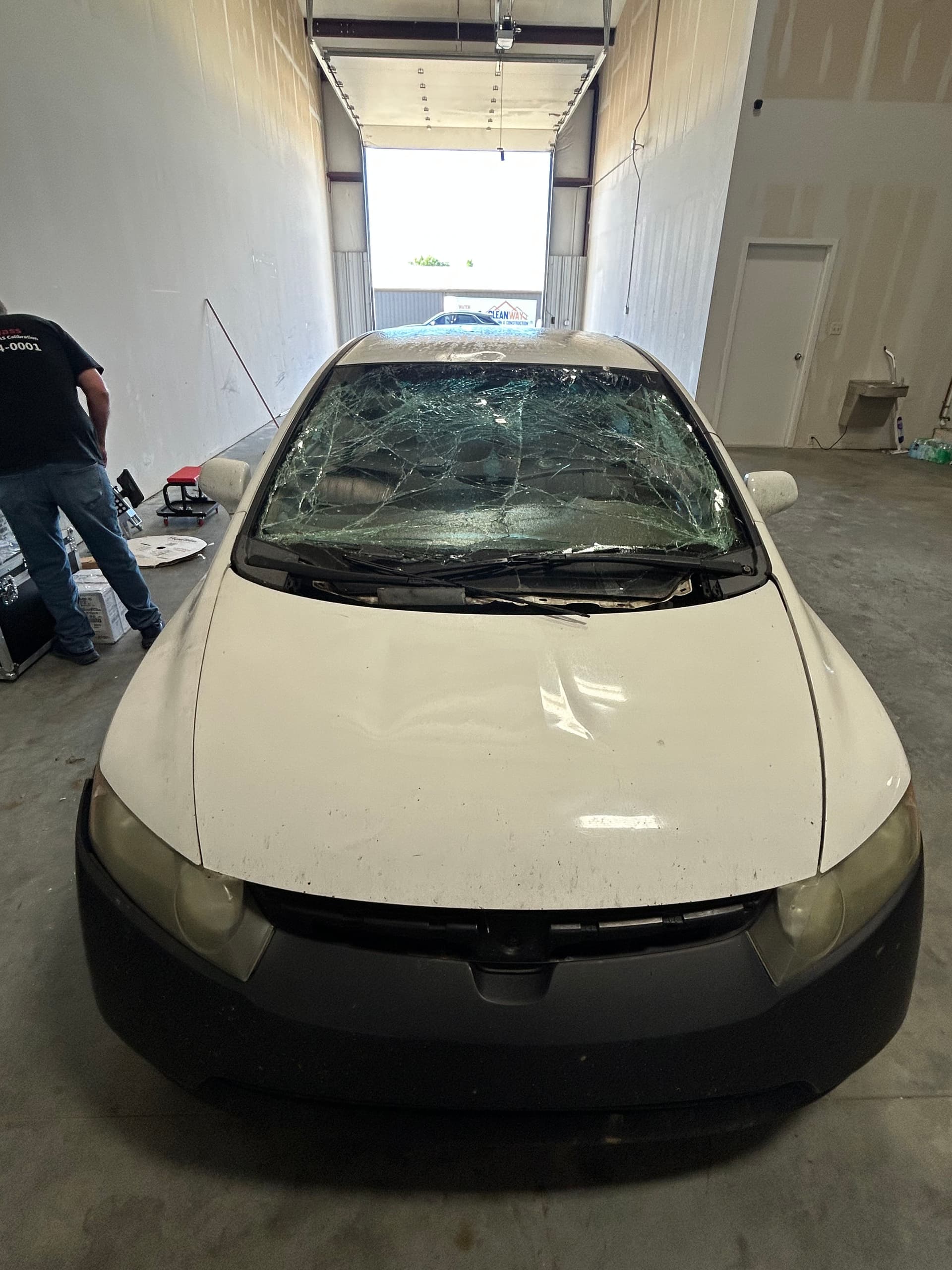 Hood Latch Failure on the Interstate Destroyed This Windshield image